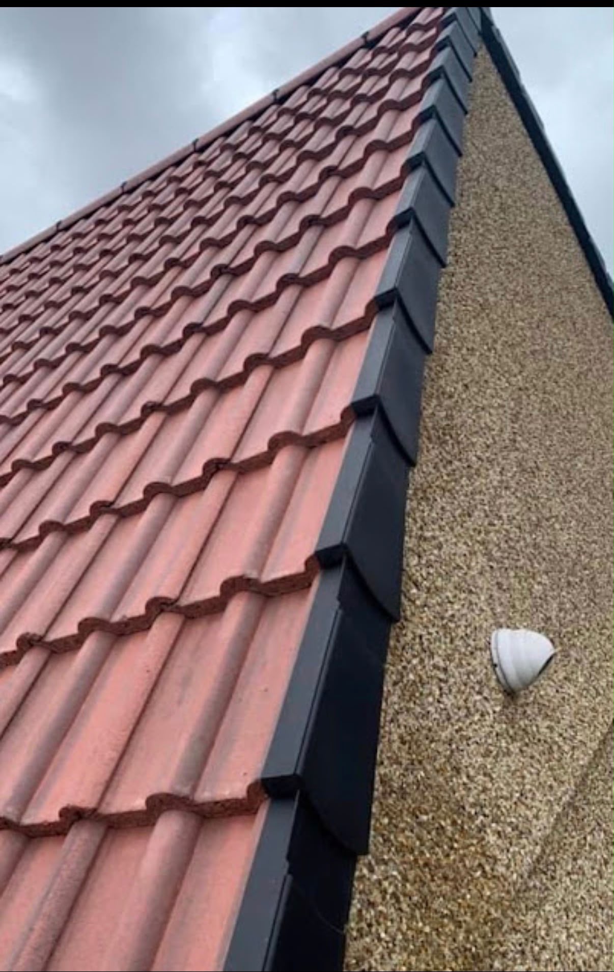 Completed re-roof with new tiles and leadwork on a property in Colchester, Essex